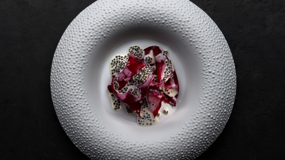Salt crusted beetroot with garden caviar cream from Mirazur.