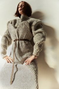 Louis Vuitton wool sweater, metallic knitted wool dress and belt; Tiffany HardWear ball necklace in sterling silver; Cartier Ecrou de Cartier ring in 18-karat white gold; John Hardy Spear Flex Cuff in silver with white diamonds and Spear Flex Cuff in dark silver with white diamonds.