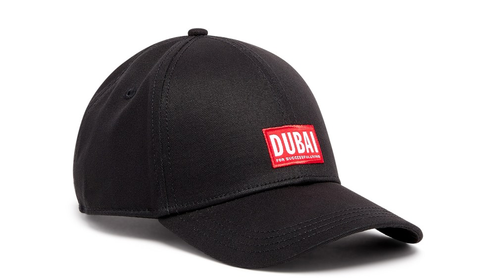 A Diesel cap with the cheeky slogan "Dubai for Successful Living."