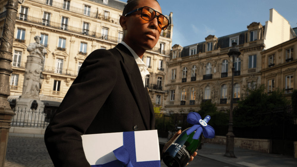 Pharrell Williams with a limited-edition magnum of Moët & Chandon Brut Impérial Champagne.
